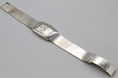 null FAURE LEUBA 

Montre bracelet d'homme, boîtier rectangulaire en or gris 18k...