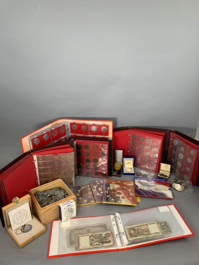 null A modern coin collection : 6 folders + a box of coins with holes + a silver...