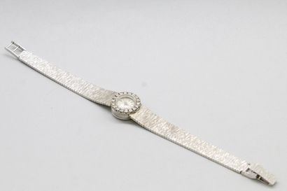 null FAVRE LEUBA 

Montre bracelet de dame, boîtier rond en or gris 18k (750), lunette...