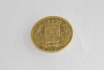 null Gold coin of 20 Francs Louis XVIII bare head. (1818 W) 

TTB to SUP.

Weight...