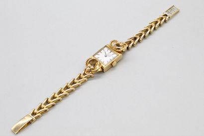 null OMEGA 

Montre bracelet de dame, boîtier carré en or jaune 18k (750), cadran...