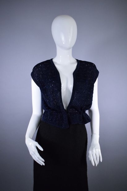 null COURREGES

Circa late 1970



Sleeveless vest in blue mesh and light blue lurex,...