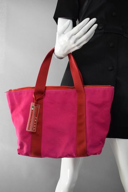 null PRADA 



Pink and red cotton tote hand carried. 

Plastic tag with typical...