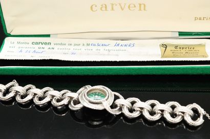 null CARVEN 



Rare montre bracelet de dame, boîtier rond, cadran à

fond vert,...