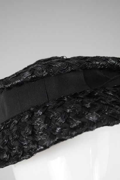 null BALENCIAGA 

Circa 1960



Beret style hat decorated with a black bow and black...