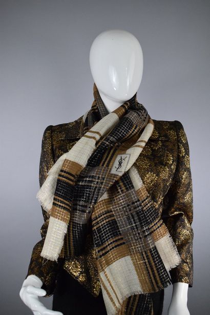 null 
YVES SAINT LAURENT 











Cream and tobacco black shawl, decorated with...