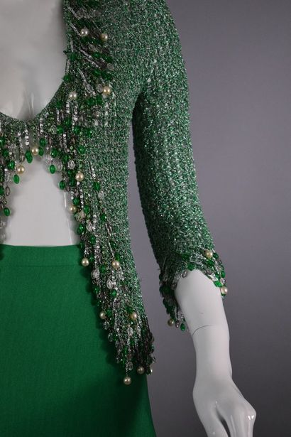 null 
LORIS AZZARO Haute Couture









Outfit consisting of a bright green flowing...
