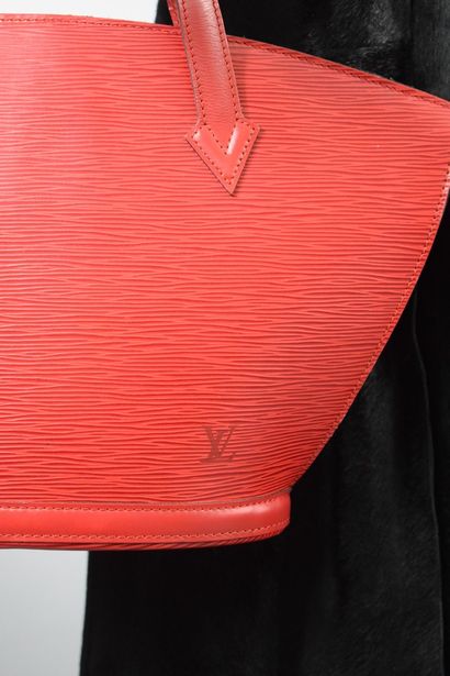 null LOUIS VUITTON 



Bag model "Saint Jacques" PM in red epi leather.

A large...