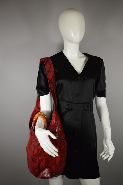 null GUCCI 

Circa late 1970



Rare "Bamboo" bag in red python, with a large handle...
