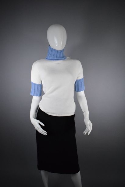 null COURREGES 



Two-tone blue and white sweater with short sleeves and chimney...