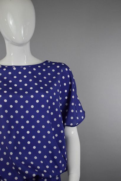 null NINA RICCI

Circa late 1970



Purple silk dress with white polka dots fitted...