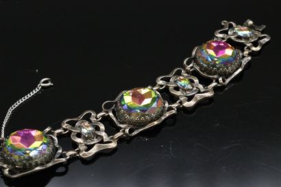 null SCHIAPARELLI 

Circa 1950



Articulated bracelet in lightly gilded/blackened...