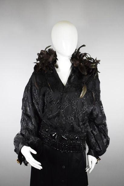null LORIS AZZARO Haute Couture (attribué à)



Rare veste en dentelle et lurex noire...