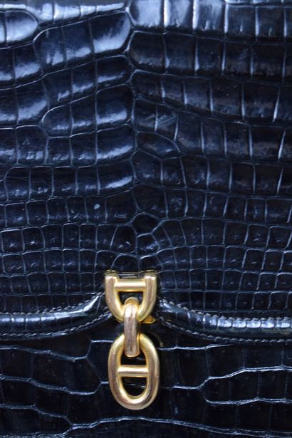 null HERMES PARIS 



Anchor chain" bag in black crocodile leather with a flap and...