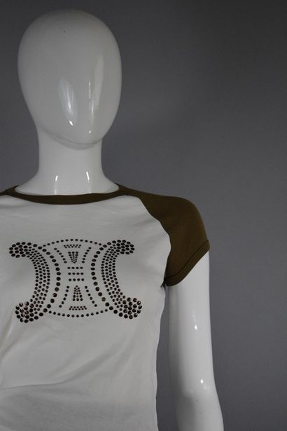 null CELINE 



Two-tone cotton blend T-shirt with "Triumph" motif studded on the...
