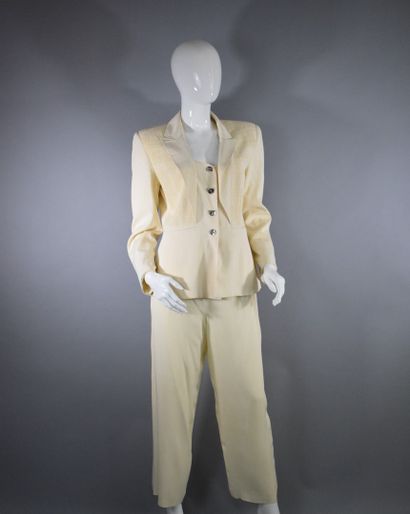 null MONTANA



Ecru set consisting of a jacket with a pleated work and stylized...