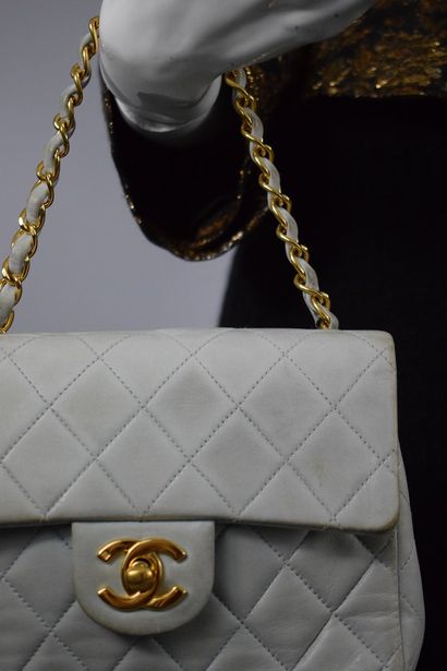 null CHANEL 



Bag model mini "timeless" in pastel blue leather, clasp signed in...