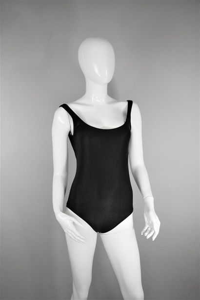 null 
CHANEL



Circa the end of 1990








Black one-piece swimsuit with white...