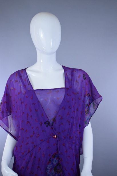 null GUY LAROCHE 



Purple silk chiffon set consisting of a strapless dress and...