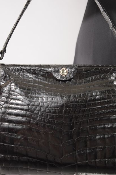 null ANONYMOUS 

Circa 1950



Black crocodile handbag, coin purse clasp with pull...