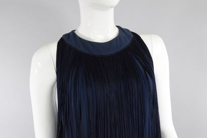 null JACQUES FATH

Circa 1970



Rare midnight blue trouser suit with bangs all around...