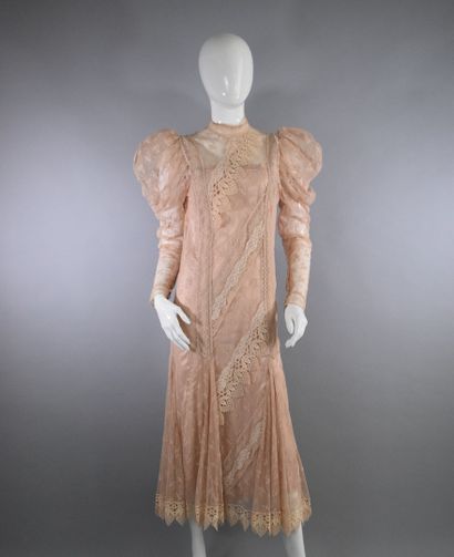 null ANONYMOUS



Dress composed of two elements including a salmon-colored lace-trimmed...