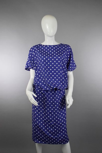 null NINA RICCI

Circa late 1970



Purple silk dress with white polka dots fitted...