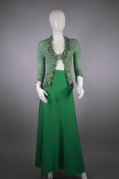 null 
LORIS AZZARO Haute Couture









Outfit consisting of a bright green flowing...