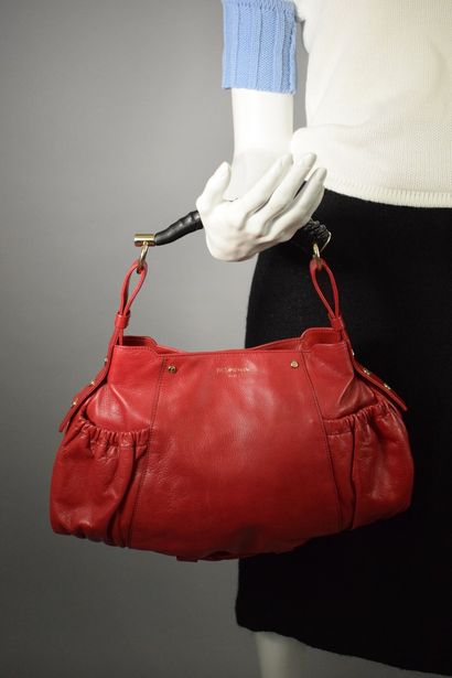 null YVES SAINT LAURENT 



Red leather bag declination of the "Mombassa" model with...