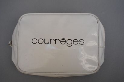 null COURREGES



A small white toiletry bag with the logo of the black House. We...