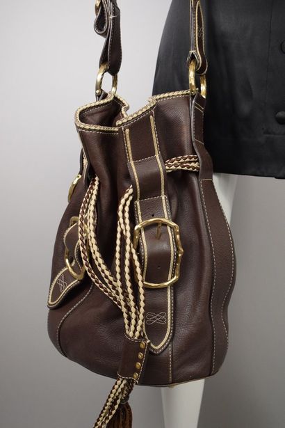 null LANCEL 



Off-white and chocolate leather bucket bag with fringed drawstring...