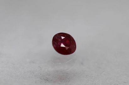 null Cushion ruby on paper.

Weight : 0.21 ct.