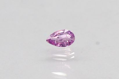 Pink/purple pear sapphire on paper.

Weight...