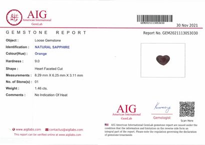 null Orange sapphire heart on paper.

Accompanied by an AIG certificate indicating...
