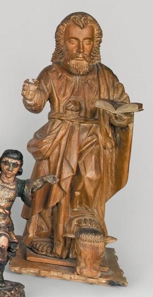 Saint Luc en bois sculpté et ciré de la fin...