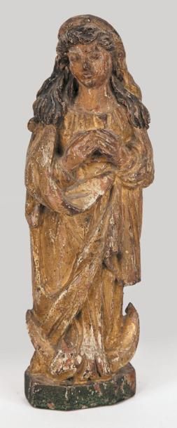 Petite Vierge en bois sculpté doré et polychrome...