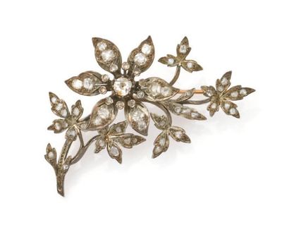 null Broche trembleuse en argent et or jaune figurant une branche fleurie sertie...