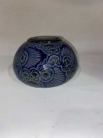 null Vase with flattened body in blue enamelled stoneware with stylized decoration...