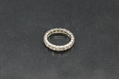 null 
American wedding band in 18K (750) white gold set with diamonds.

Gross weight:...