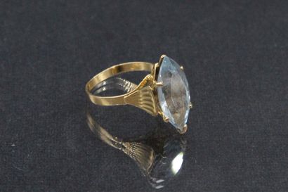 null Yellow gold ring 18K (750) decorated with a synthetic spinel.

Eagle head hallmark.

Finger...