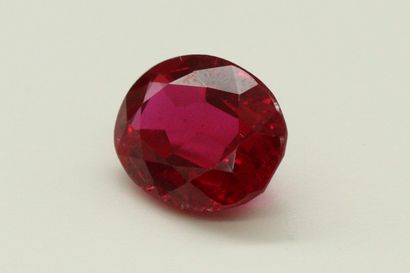null Oval synthetic ruby on paper. 

Weight : 7.70 cts.