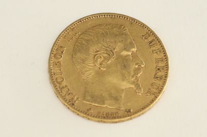 A gold coin of 20 francs Napoleon III bare...