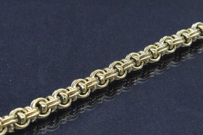null Bracelet in 18K (750) yellow gold with a double chain stitch set with small...