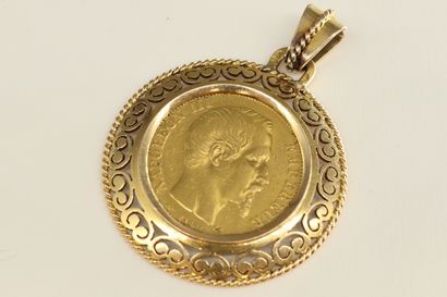 null Gold coin of 20 Francs Napoleon III bare head (1856) mounted in a corolla pendant....