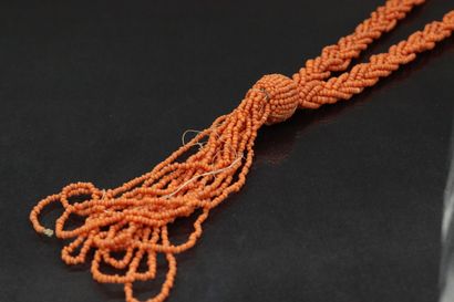 Long necklace with braided rows of coral...