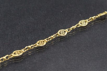 Curb in 18k (750) yellow gold with filigree...