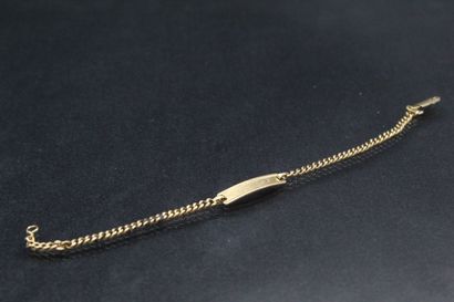 null Curb in 18k (750) yellow gold with inscription "Philippe".

Wrist size : 16...