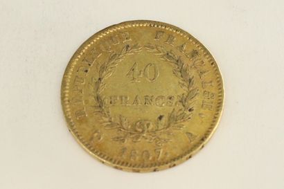 null Une pièce en or de 40 francs Napoléon tête nue, calendrier grégorien

1807 A...