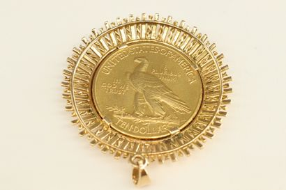 null Gold coin of 10 Dollars Indian Head mounted in pendant with radiant pattern...