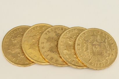 null Five gold coins of 20 francs Napoleon III head.

1863 A (x1) - 1863 BB (x1)...